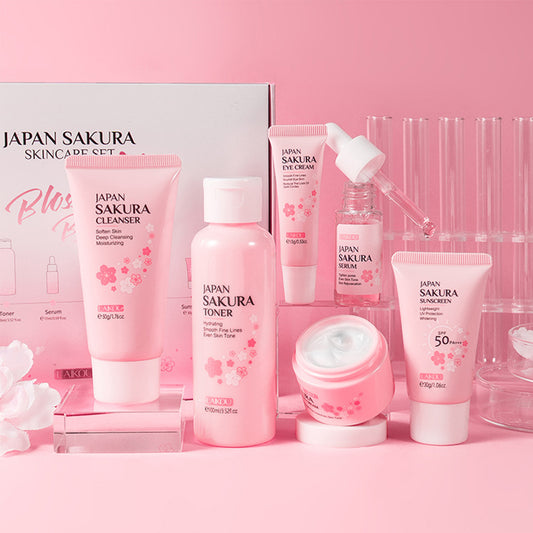 Set de cuidado de la piel JAPAN SAKURA Juegos de regalo de belleza para mujeres Kit de cuidado de la piel con limpiador, tónico, loción, suero, crema para ojos, crema facial Kit de viaje, tamaños compatibles con TSA, 6 piezas